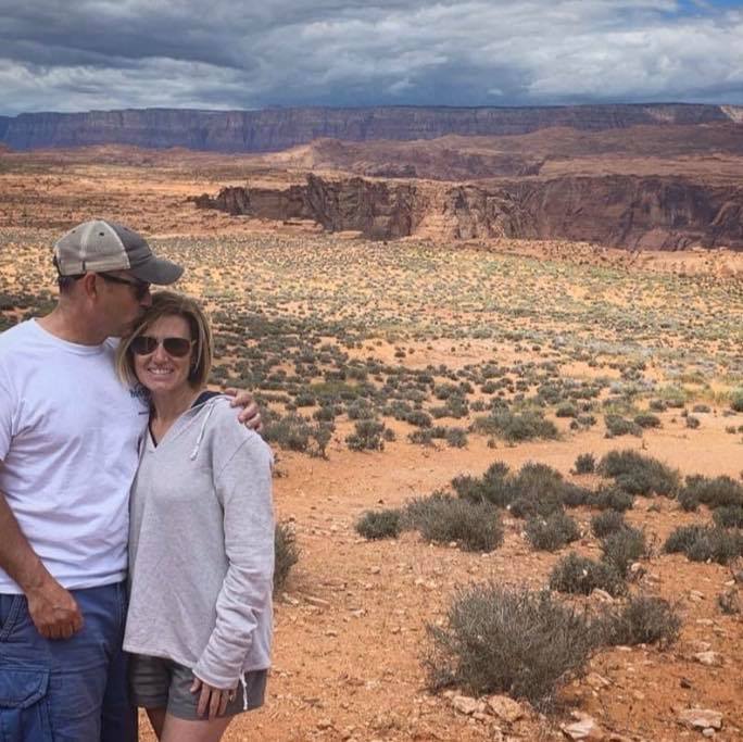 Michelle Letcher and her husband hiking.