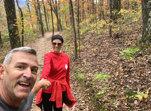 Michelle Letcher and her husband hiking.